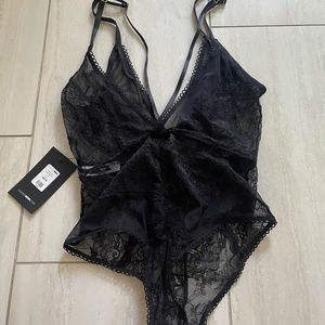 Black lingerie bodysuit from FashionNova